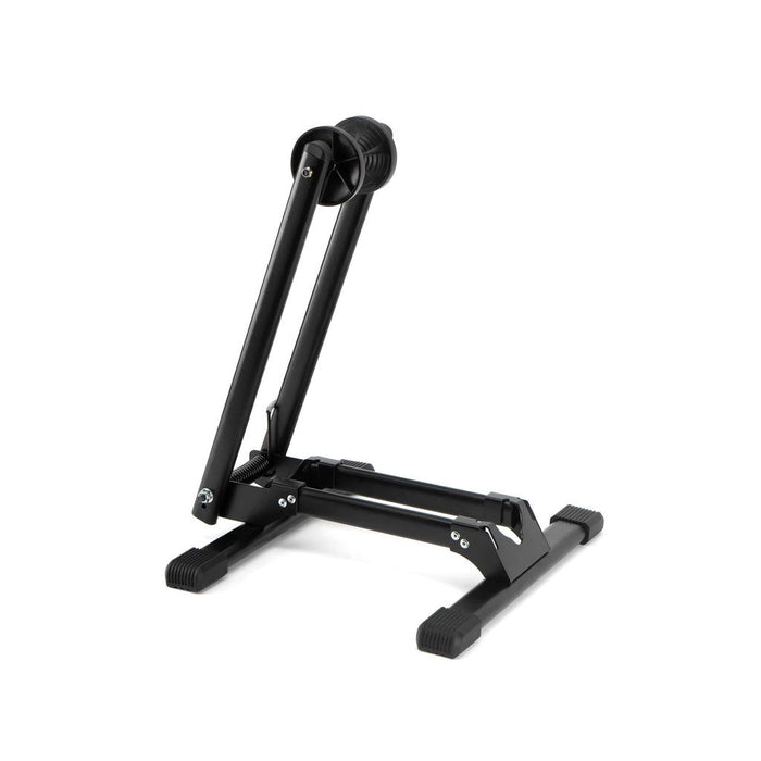 The 6MIL BS-01 Bike Stand is a black, heavy-duty stand with foldable metal arms and rubber-tipped feet, shown upright against a white background.