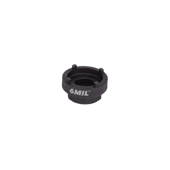 The 6MIL Freewheel Removal Tool (14T) is a black, circular metal tool with four prongs and "6MIL" printed on the side, ideal for BMX freewheel removal. Shown on a plain white background.