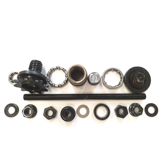 Assorted parts from the Academy Origin Bike 10mm FC Hub Kit—including ball bearings, nuts, washers, threaded axle, and gear components—are arranged neatly on a white background.