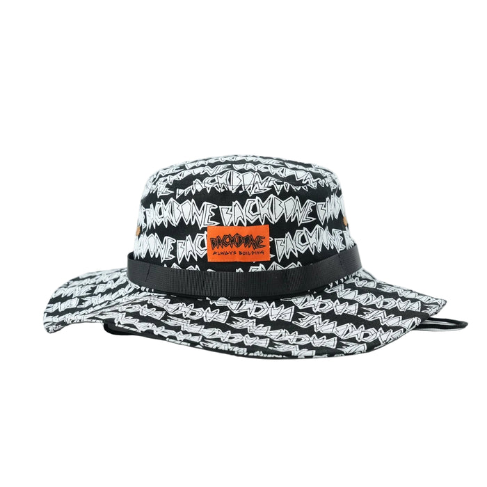 The Backbone AO Boonie is a black bucket hat featuring white graffiti-style "BACKVINE" lettering and an orange rectangular front patch—ideal for Backbone BMX fans who want standout style.