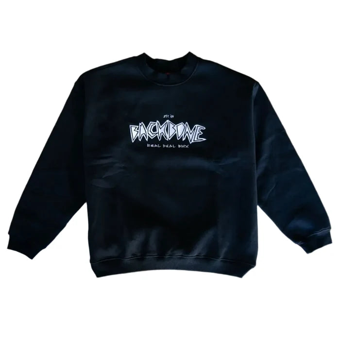 The Backbone Real Deal Crewneck features "BACKBONE REAL DEAL BMX" in white graffiti-style text on the front, laid flat on a gray surface—an ideal winter essential.