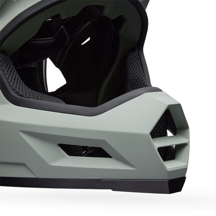 Close-up of the Bell Sanction 2 Dark Grey, an entry-level kids bike helmet with a chin guard, ventilation openings, and interior padding—ideal for young riders seeking dependable protection.