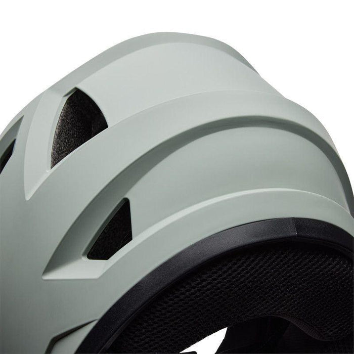 Close-up of the Bell Sanction 2 Dark Grey helmet featuring black inner padding and angular vents, ideal for entry-level riders.