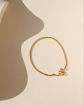 14k gold fill chain bracelet in the sunlight