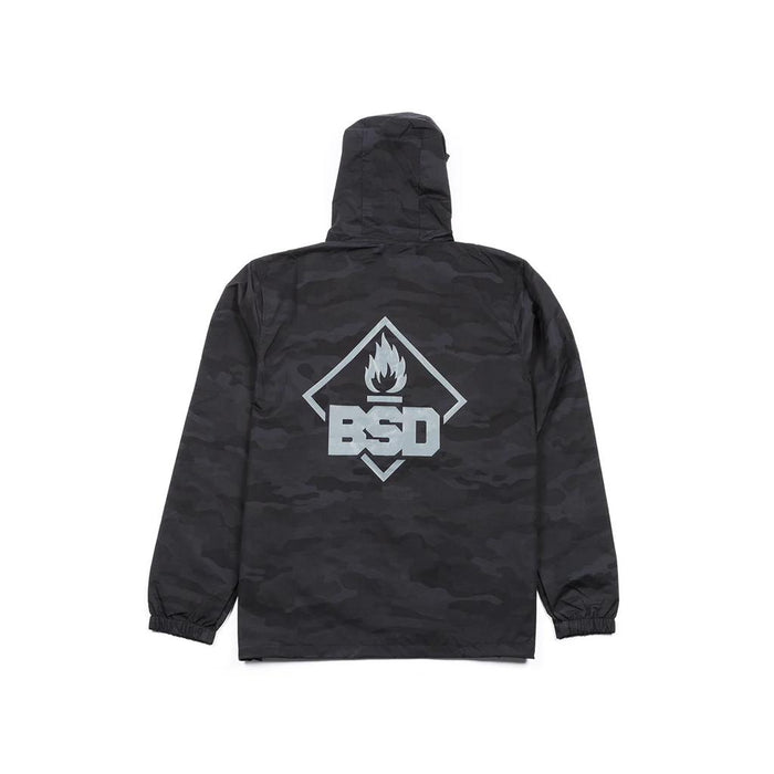 The BSD Roastin Jacket features a black camo water-resistant design with a hood and long sleeves. It has a large graphic on the back featuring "BSD" below a flame inside a rhombus.