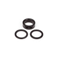 A set of black BSD West Coaster Gap Washers and rings on a white background, perfect for West Coaster Hubs and as a spare gap washer kit.