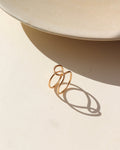 14k gold filled buckle ring in the sun.