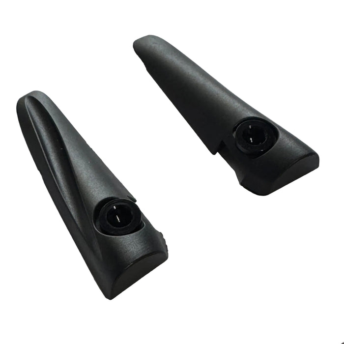 Two black plastic Chase ACT 1.2 V-Brake Mount Aero Covers are shown on a plain white background, each angled to display the visible screw holes, evoking the appearance of sleek components such as nylon cleats or car door handles.