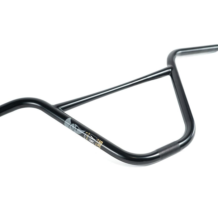 Colony Guardian Bars (22.2mm Clamp) shown in black with a crossbar, constructed from heat-treated 4130 chromoly steel, and sporting a small logo and text decal near the grip area, photographed on a white background.