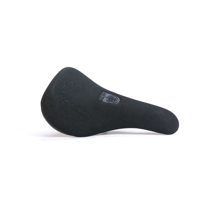 The Colony Sigil Pivotal Seat (Sean Gardner Signature) is black with an embossed pattern and a small logo near the center, displayed against a plain white background.