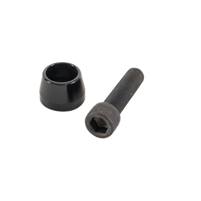 A black metal hex socket cap screw from the Colony Wasp Supreme Volcano Hub Front/Rear Female Bolt Kit (x1) is displayed alongside a black cylindrical cap on a white background—an ideal BMX bolt solution for riders who value both style and durability.