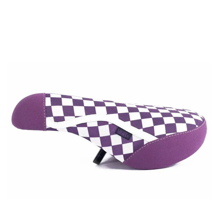 The Cult Vans Old Skool Checker Pivotal Seat is a limited edition BMX seat in purple and white checks, featuring a side Vans logo tag, shown on a plain white background.