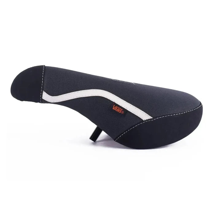 The Cult Vans Pivotal Old Skool Seat in Black/White features a white curved stripe and visible Vans tag, photographed on a plain white background. This limited edition seat offers style and comfort for your BMX ride.