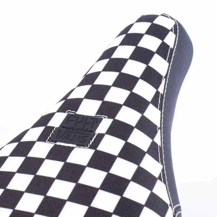 Close-up of the Cult X Vans Slip On Checker Seat, featuring the classic checker pattern and a stitched "Vans" label.