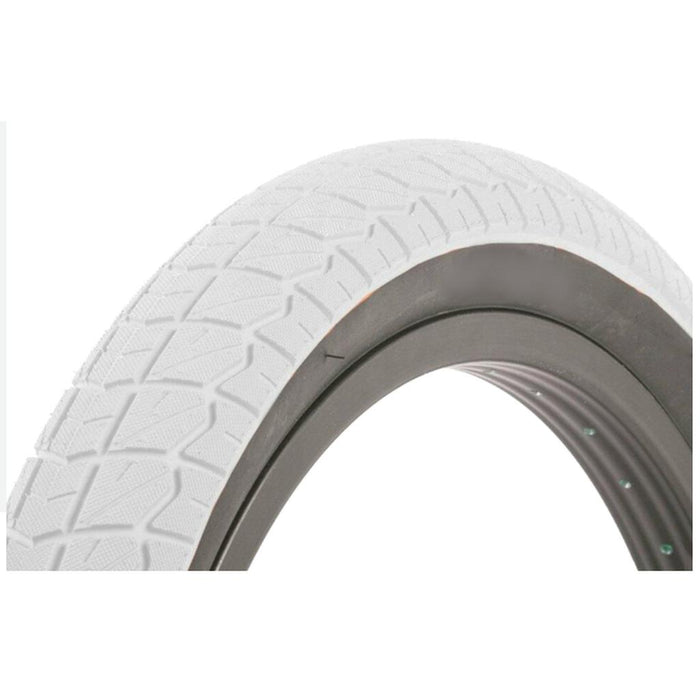 Close-up of the Duro 20 Inch Tyre in white, featuring a textured tread pattern and dark gray rim—perfect for budget-conscious riders who still want quality.