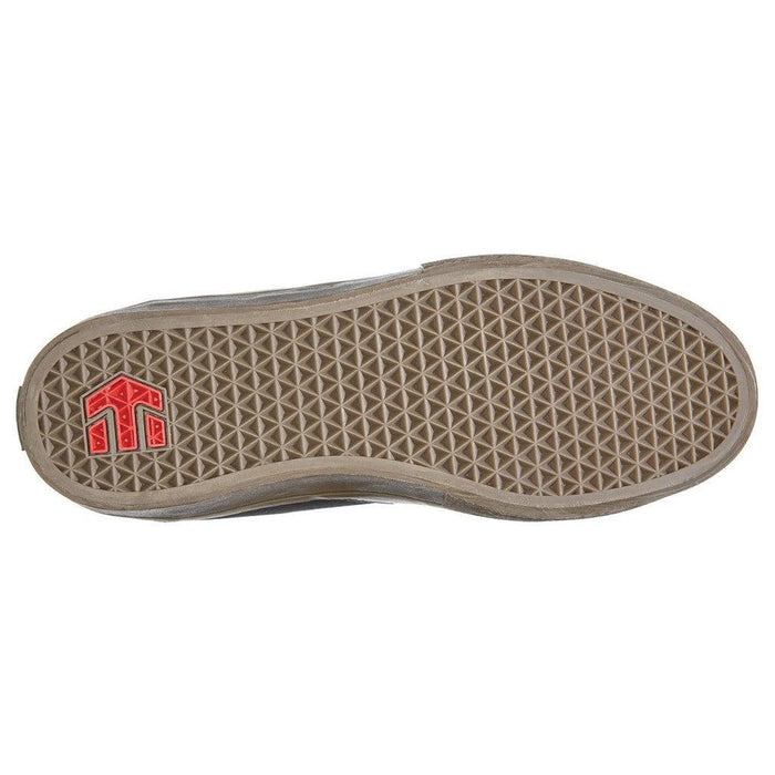 The Etnies Screw Vulc Mid X Rad Shoe with a red logo on the top.