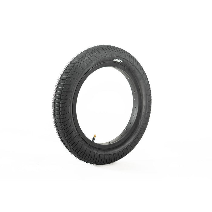 The Family F641 14 Inch Tyre is a black BMX rubber tyre with a knurled tread pattern and visible valve stem, shown standing upright on a white background.