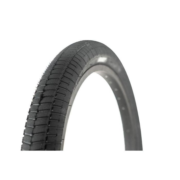 A close-up of the Family F641 20 Inch Tyre in black, featuring a knurled tread pattern, displayed against a white background.