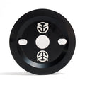 The Federal Code Guard Sprocket is a black circular metal sprocket with two oval slots, a central hole, and three white abstract Federal logos—designed for BMX enthusiasts.