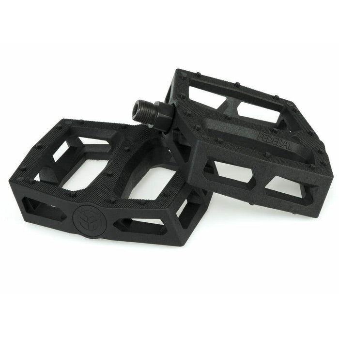 A pair of Federal Command Plastic Pedals, featuring a black rectangular design with textured, cut-out surfaces for BMX use, are shown on a white background.
