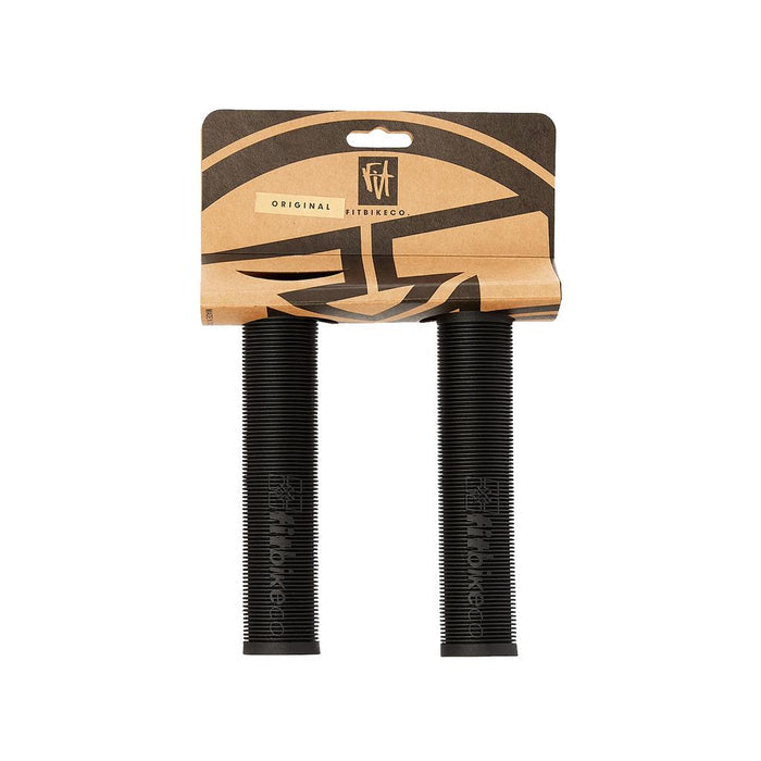 A pair of black Fit Bike Co OG Grips with a ribbed, mushroom-finned design are shown in packaging marked "Original FITBIKECO.