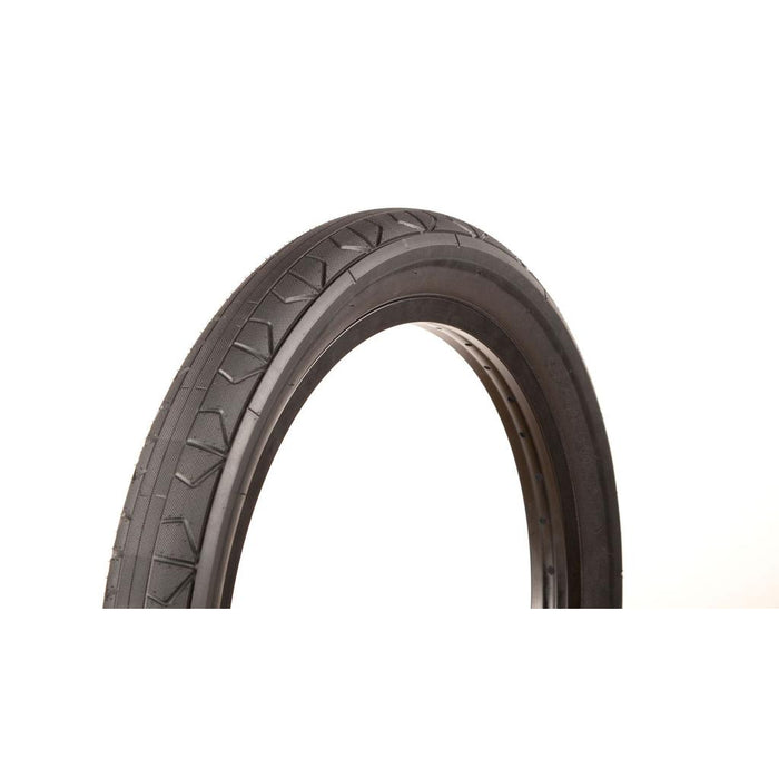 The FITBIKECO F/U 20 Inch Tyre is shown upright against a white background, highlighting its tread pattern and durable sidewall. Engineered to resist pinch flats, this black BMX tire delivers reliable performance for riders, even at lower pressures.