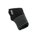 The Fuse Alpha Pro Wrist Guards (Pair), made from anti-bacterial neoprene with a striped elastic band and mesh panel, are black and shown on a plain white background.