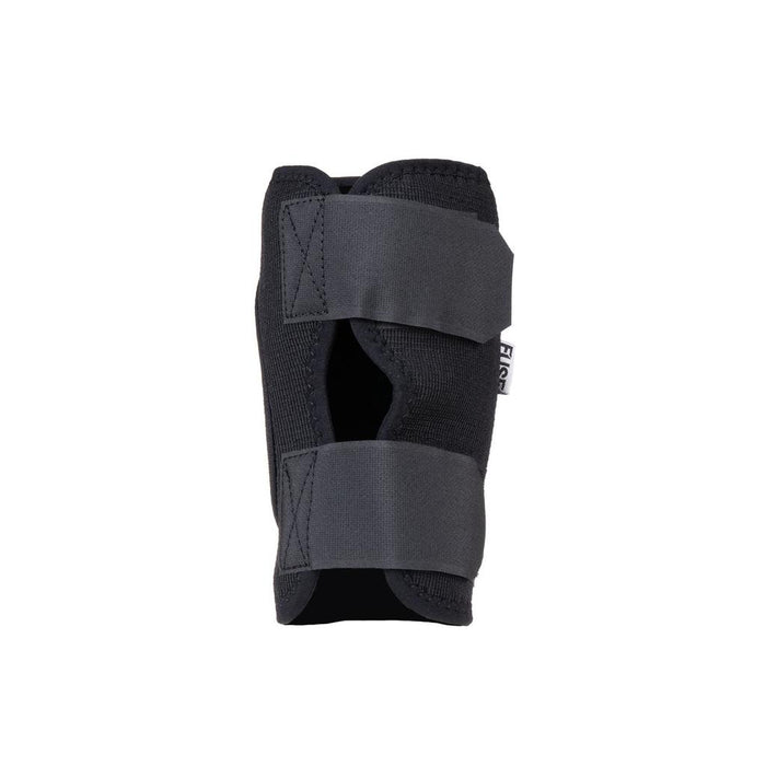 A pair of Fuse NXG Shin Pads with two wide adjustable straps and visible stitching, shown against a white background—an ideal addition to youth protective gear for active kids.