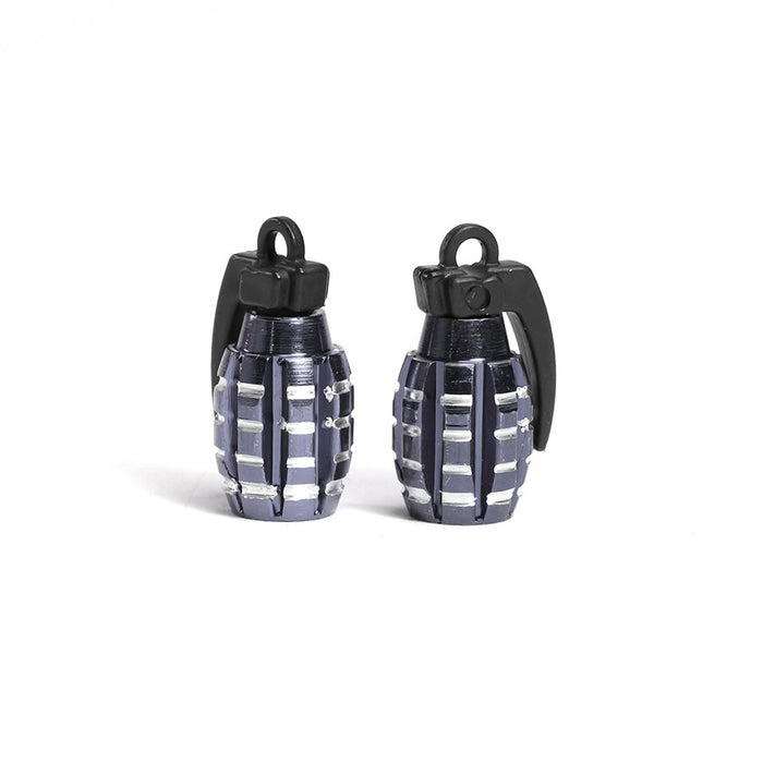 Sold as a pair, the Grenade Valve Caps feature black tops and silver-gray segmented bodies, resembling mini hand grenades—ideal for adding a bold touch to your collection. Displayed on a white background.
