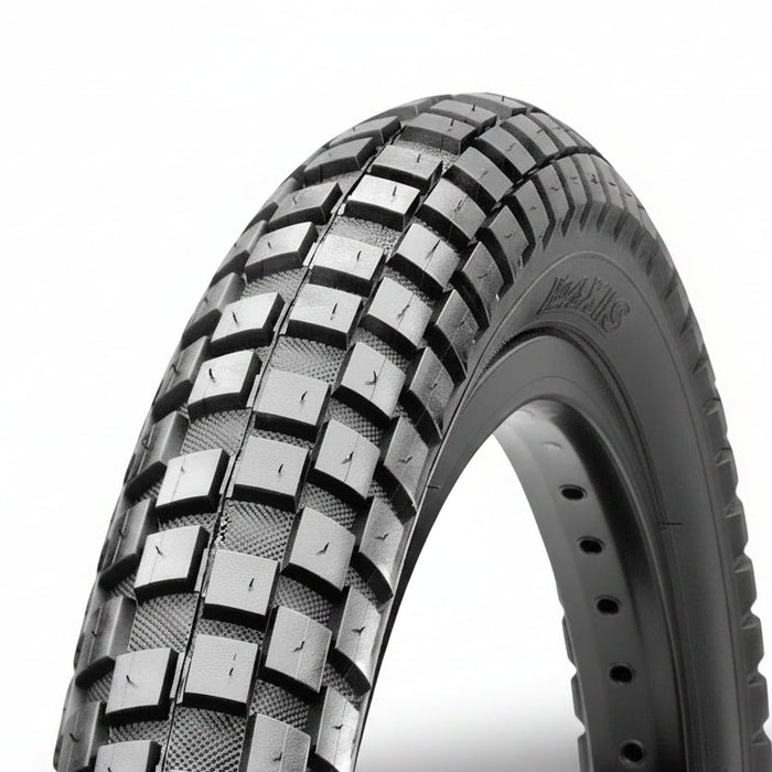 Close-up of a HOLY ROLLER 26" Wire Bead tyre with a knobby tread pattern, designed for off-road or dirt jump use, set against a plain white background.