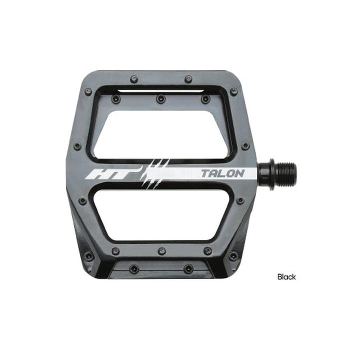 The HT AN71 Talon Pedals feature a wide flat platform, multiple grip pins, and a visible logo across the center.