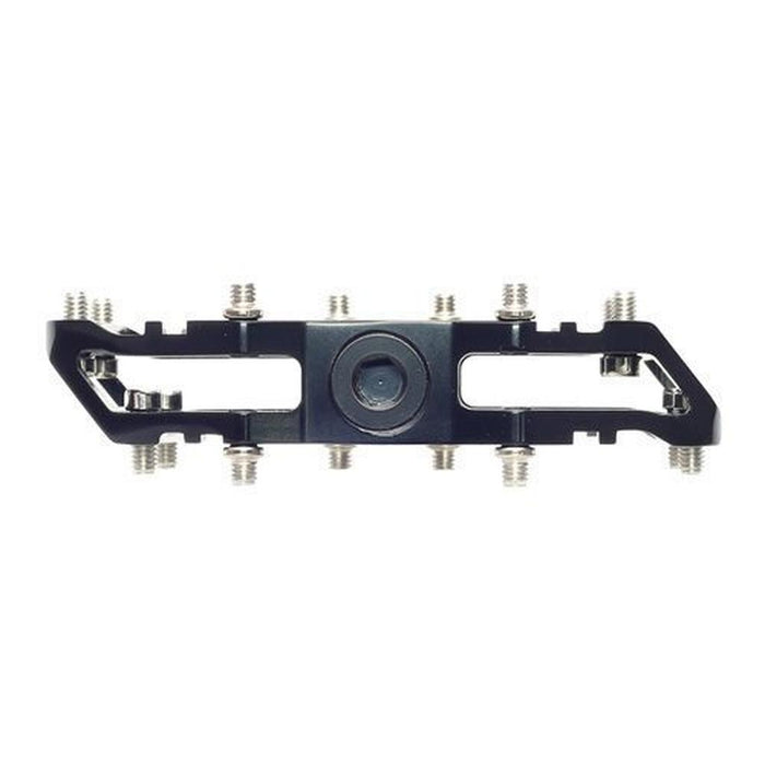 HT Components AR09SX Mini Pedals—black metal BMX platform pedals for kids, feature multiple silver screws for extra grip and a central circular opening, shown from above on a white background. Ideal grippy pedals for young riders.