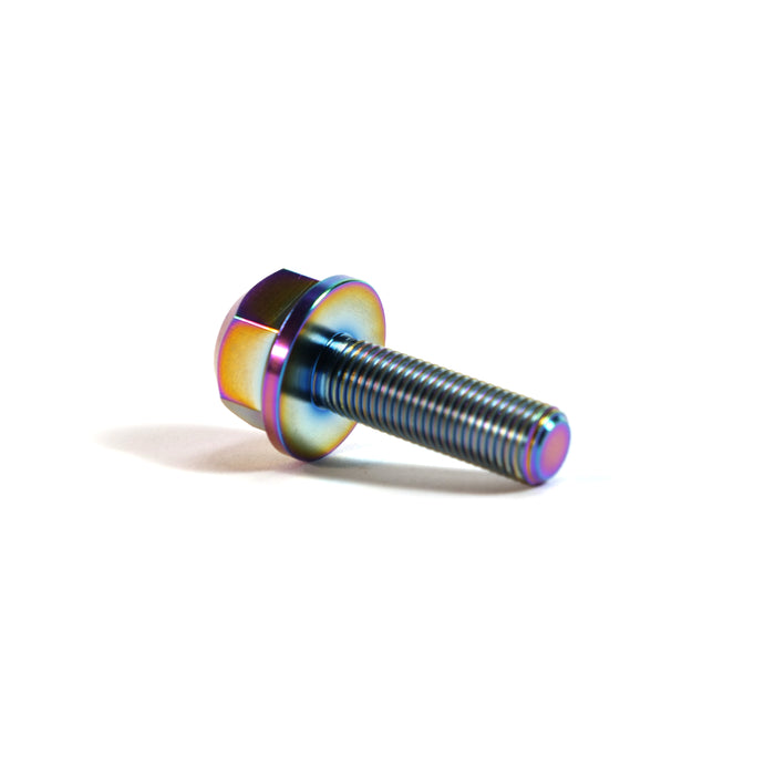 A close-up of the ION BMX Titanium GR5 Hex Axle Bolt, featuring a rainbow iridescent finish, resting on a white surface—ideal as a CNC machined titanium axle bolt for BMX bikes.