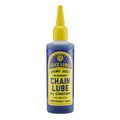 A bottle of Juice Lubes Viking Juice (Chain Lube Oil) with a yellow label and nozzle, designed for professional-grade, long-lasting bike lubrication in all conditions.