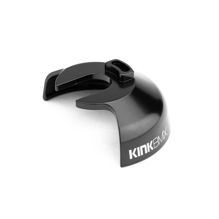 The Kink Universal Driver Hub Guard is a black chromoly BMX hub guard with a cutout slot and the white KINK BMX logo on the side. Durable protection for your hub, shown photographed on a white background.