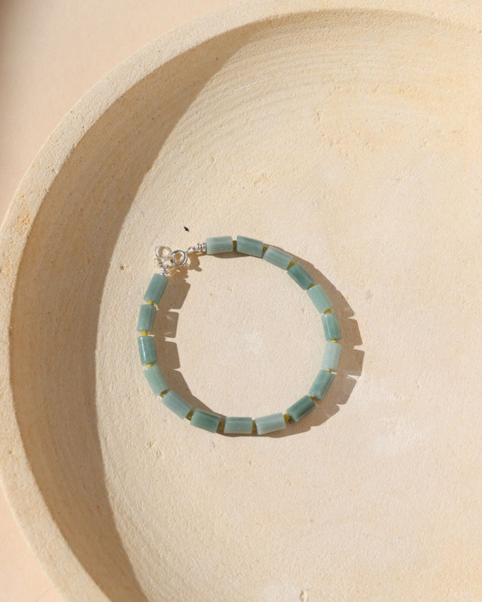 Jade and Serpentine gemstone beads alternate to make a bracelet with sterling silver fixings