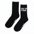 A pair of black LUXBMX FAF Race Crew Socks, featuring "FAST AS F\*\*K." on the upper side of one sock and "UNDRPLY" on the toes of both. These durable socks are ideal for BMX race sessions or everyday wear.