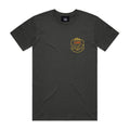 LUXBMX Gold Tee Coal – a black short-sleeve classic crewneck featuring a small yellow "LUX BMX" crest logo on the left chest, showcased on a flat white background. A must-have for any fan of this Brisbane icon.
