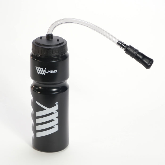 The LUXBMX Race Straw Water Bottle 750ml features a black design, screw-on lid, and an attached clear flexible drinking tube with a bite-valve, displayed on a plain white background.