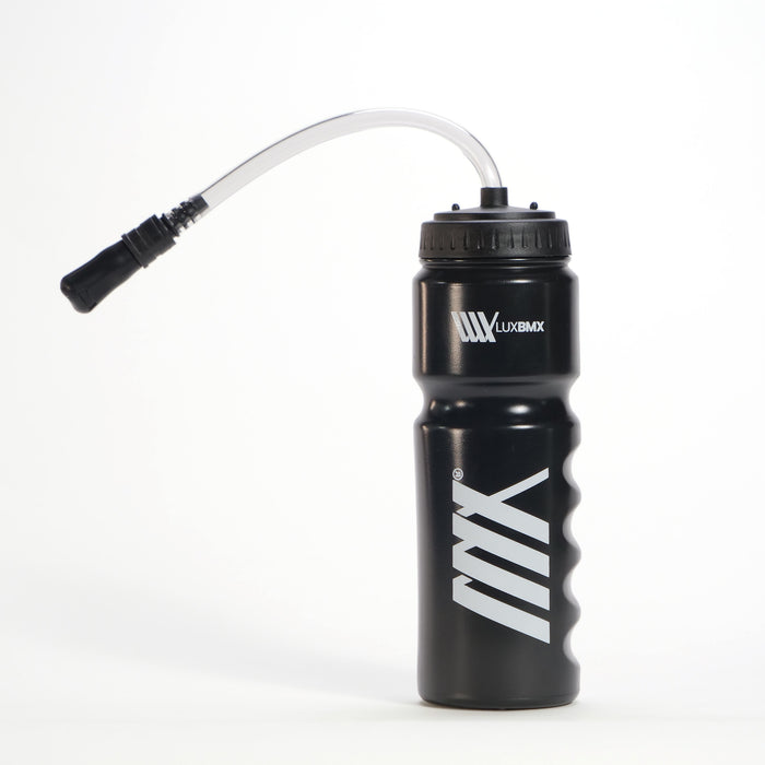 The LUXBMX Race Straw Water Bottle 750ml is black with white "LUXBMX" and "MX" logos and a curved bite-valve drinking tube on the lid, displayed against a plain white background.