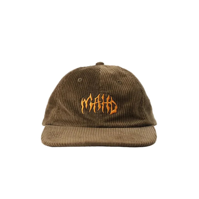 The Mahd Metal Corduroy Hat features a brown corduroy crown and an orange "MATH" logo in a jagged font on the front, shown against a white background.