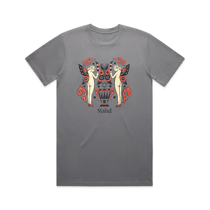 The Mahd Wesley Tee features an abstract design with two nude figures, red and black butterfly wings in traditional tattoo style, decorative red patterns, and "Mahd" printed below. Inspired by Cape Town artistry.