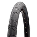 A close-up of the Maxxis Hookworm 24 Inch Tyre highlights its textured tread and visible Maxxis branding on the sidewall, engineered for flat-resistant urban cycling.