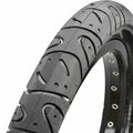 Close-up of a black Maxxis Hookworm 29 Inch Tyre showcasing its textured tread and rim eyelets, designed for urban riding.