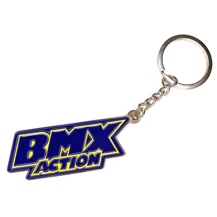 The MCS BMX Action Key Ring features a blue and yellow "BMX ACTION" logo in soft enamel on zinc alloy, attached by a short chain to a round key ring.