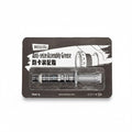 A 5g syringe of MolicSYN Prime Anti-Seize Grease, a high-performance bike anti-seize lubricant, in black packaging with English and Chinese text and a background graphic of gears.