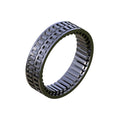 An Onyx Sprag Clutch with evenly spaced rectangular slots on the outer and inner surfaces, perfect for those looking to get ripping through their projects. This product description highlights its efficient design and functionality.