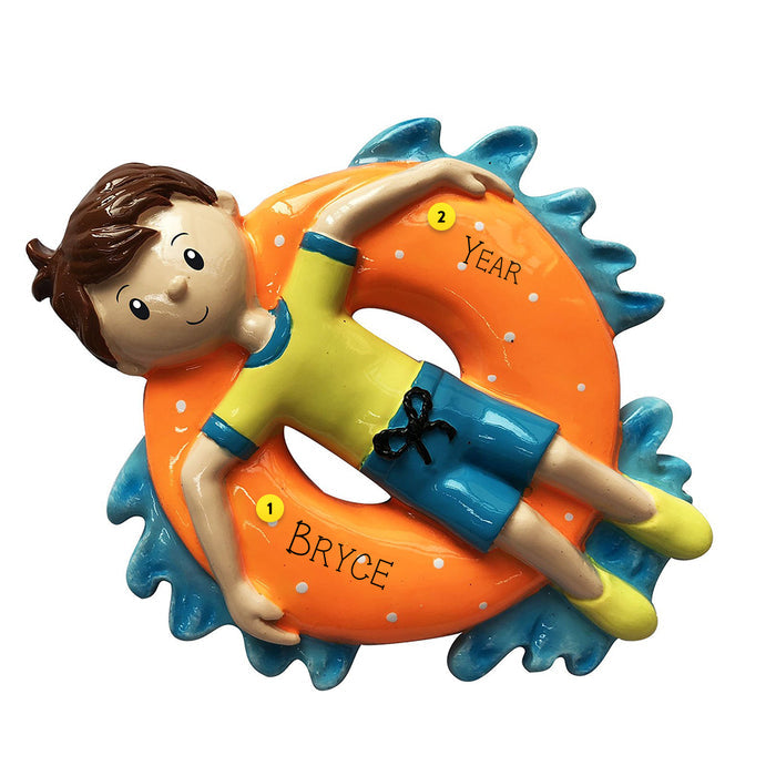 Boy in inner tube ornament for Christmas as tree
