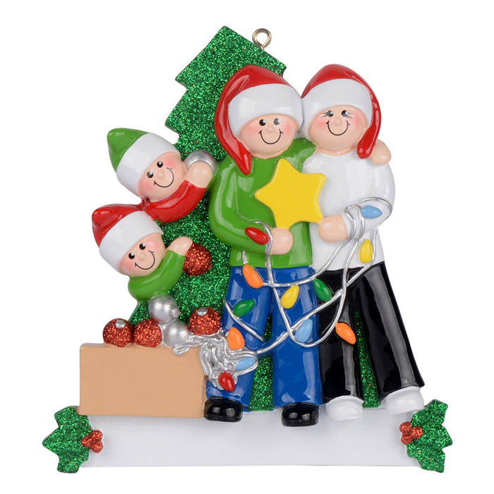 Family of 4 decorating a Christmas tree ornament