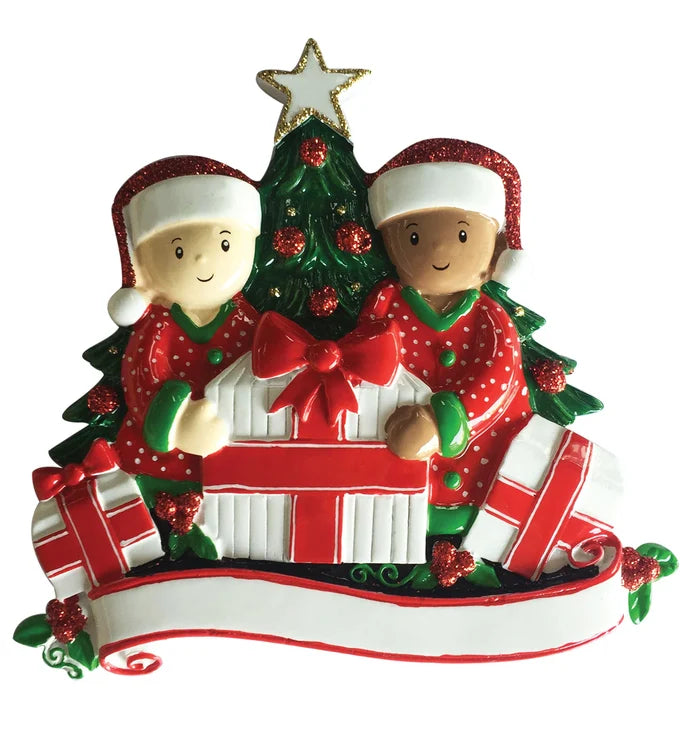 Interracial Couple Opening Presents on Christmas Ornament